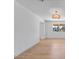 The living room is spacious with hardwood floors and natural light at 1642 E Turney Ave, Phoenix, AZ 85016