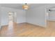 The living room is spacious with an open floorplan and wood floors at 1642 E Turney Ave, Phoenix, AZ 85016