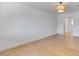 The living room is spacious with hardwood floors and natural light at 1642 E Turney Ave, Phoenix, AZ 85016