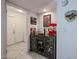 Stylish bar area with dark wood cabinets, and decorative accents for intimate entertaining at 1699 Leisure World --, Mesa, AZ 85206