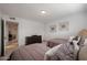 Comfortable bedroom featuring twin beds, dresser, and tile floors at 1699 Leisure World --, Mesa, AZ 85206