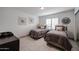 Cozy twin bedroom featuring tile flooring, and shutters on the window at 1699 Leisure World --, Mesa, AZ 85206