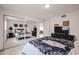 Bright bedroom featuring mirrored closet doors and a neutral tile floor at 1699 Leisure World --, Mesa, AZ 85206