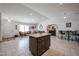 Spacious open floorplan with a kitchen island, tile floors, and recessed lighting at 1699 Leisure World --, Mesa, AZ 85206