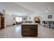 Spacious open floorplan with a kitchen island, tile floors, and recessed lighting at 1699 Leisure World --, Mesa, AZ 85206