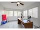 Bright office features a ceiling fan and large windows for ample natural light and tile flooring at 1699 Leisure World --, Mesa, AZ 85206