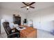 Bright office features a ceiling fan and large windows for ample natural light, along with tile flooring at 1699 Leisure World --, Mesa, AZ 85206