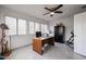 Bright office features a ceiling fan and large windows for ample natural light, along with tile flooring at 1699 Leisure World --, Mesa, AZ 85206