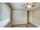This bedroom has a wide closet and fan at 17841 N 20Th St, Phoenix, AZ 85022