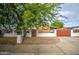 Charming single-story home with secure gated entry and beautiful landscaping at 17841 N 20Th St, Phoenix, AZ 85022