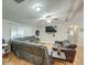 Large open living room, with leather seating, ceiling fan and recessed lighting at 17841 N 20Th St, Phoenix, AZ 85022