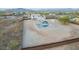 Expansive property with home and pool area, including a gazebo, surrounded by a fenced yard for privacy at 1819 W Joy Ranch Rd, Phoenix, AZ 85086