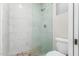 Bathroom with tiled walls, glass shower and neutral colored flooring at 1819 W Joy Ranch Rd, Phoenix, AZ 85086