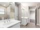 A well-lit bathroom with double sinks and updated fixtures at 1819 W Joy Ranch Rd, Phoenix, AZ 85086