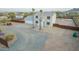Two-story home with an attached garage, mature landscaping, and a fenced yard offering privacy and curb appeal at 1819 W Joy Ranch Rd, Phoenix, AZ 85086