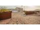 Two-story desert home featuring attached garage and gravel driveway at 1819 W Joy Ranch Rd, Phoenix, AZ 85086