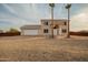 Charming two-story home featuring a neutral palette, tile roof, arched entry and attached two car garage at 1819 W Joy Ranch Rd, Phoenix, AZ 85086