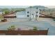 Two-story home with an attached garage, mature landscaping, and a fenced yard offering privacy and curb appeal at 1819 W Joy Ranch Rd, Phoenix, AZ 85086