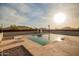 Sparkling pool with diving board and plenty of deck space offers a refreshing oasis with scenic mountain views at 1819 W Joy Ranch Rd, Phoenix, AZ 85086