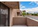 Cozy balcony offering views of the green golf course and blue skies at 1920 W Lindner W Ave # 277, Mesa, AZ 85202