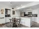 Charming kitchen with stainless steel appliances, granite countertops, and a dining area at 1920 W Lindner W Ave # 277, Mesa, AZ 85202