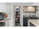 Pantry and laundry area off kitchen, features modern washer and dryer set at 1920 W Lindner W Ave # 277, Mesa, AZ 85202