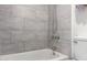 Modern shower featuring light gray tiling and new fixtures in the bathroom at 1920 W Lindner W Ave # 277, Mesa, AZ 85202