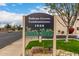 Dobson Greens Condominiums sign with address displayed above desert landscape at 1920 W Lindner W Ave # 277, Mesa, AZ 85202