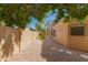 Spacious backyard featuring gravel landscaping and a block wall at 2060 N Sunset Dr, Chandler, AZ 85225