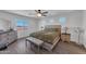 Serene bedroom featuring a comfortable bed, decorative elements, and ample natural light at 23290 N 175Th Ln, Surprise, AZ 85387