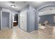 View of hallway with archway into living room and bathroom entrance at 23955 W Hidalgo Ave, Buckeye, AZ 85326