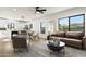Bright, neutral living area featuring modern decor and large windows that flood the space with natural light at 2601 E Willetta St, Phoenix, AZ 85008