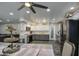 Spacious kitchen with stainless steel appliances, gray cabinets, and recessed lighting at 2607 W Ironstone Ave, Apache Junction, AZ 85120