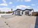 Well-maintained single-story home with a gravel front yard and concrete driveway at 2609 N 65Th Dr, Phoenix, AZ 85035