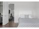 Bedroom with a comfortable bed and open doorway to a home gym at 280 W Wisteria Pl, Chandler, AZ 85248