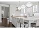 Stylish kitchen features white cabinets, butcher block counters and a large island at 280 W Wisteria Pl, Chandler, AZ 85248