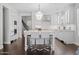 Bright kitchen featuring a large island with seating and modern lighting fixtures at 280 W Wisteria Pl, Chandler, AZ 85248