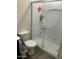 Bathroom with a large shower featuring a glass door and built in shelves at 30386 N Juniper Dr, Florence, AZ 85132