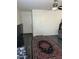 A view of the living room showcasing the front door and tile flooring at 30386 N Juniper Dr, Florence, AZ 85132