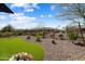Spacious backyard with low-maintenance landscaping and artificial grass at 3074 N 167Th Dr, Goodyear, AZ 85395