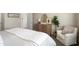 Bright bedroom with light walls, comfortable furnishings, and a neutral color palette at 3074 N 167Th Dr, Goodyear, AZ 85395