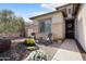 Inviting front porch with cozy seating, decorative pillows, and a welcoming atmosphere at 3074 N 167Th Dr, Goodyear, AZ 85395