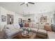 Spacious living room adjacent to the kitchen and dining area at 3074 N 167Th Dr, Goodyear, AZ 85395