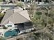 Aerial view of a home featuring a private pool and outdoor living space with pergola at 32742 N 15Th Gln, Phoenix, AZ 85085