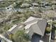 An aerial view of a house showcasing the tile roof, desert landscaping, and inground pool at 32742 N 15Th Gln, Phoenix, AZ 85085