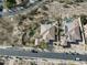 Aerial view of a property with desert landscaping and a sparkling pool at 32742 N 15Th Gln, Phoenix, AZ 85085