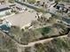 Aerial view of a single-Gathering home with a swimming pool, patio, and desert landscaping at 32742 N 15Th Gln, Phoenix, AZ 85085