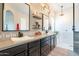 Modern bathroom featuring dual sinks, ample counter space, and designer fixtures at 32742 N 15Th Gln, Phoenix, AZ 85085