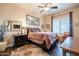 Bedroom featuring dark wood furniture, a rug, and a neutral color scheme at 32742 N 15Th Gln, Phoenix, AZ 85085