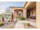 Charming front yard with desert landscaping and covered porch in a Southwestern style home at 32742 N 15Th Gln, Phoenix, AZ 85085